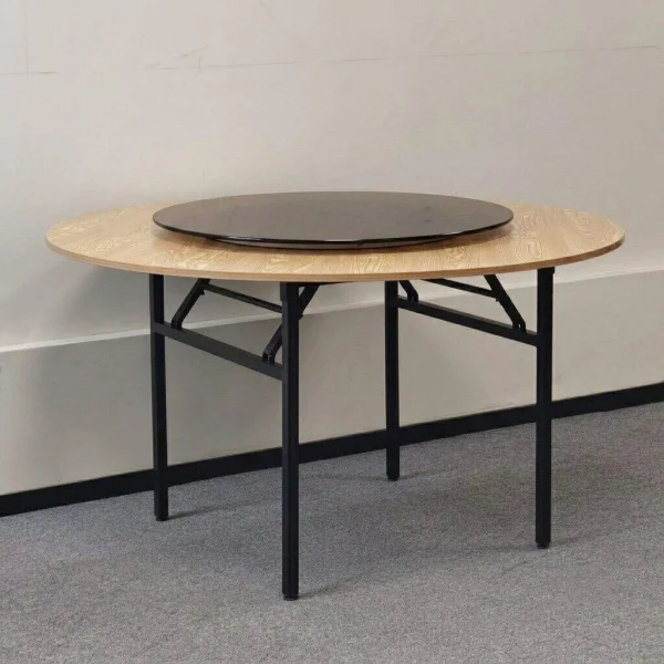 Mesa redonda con patas de hierro y plato giratorio